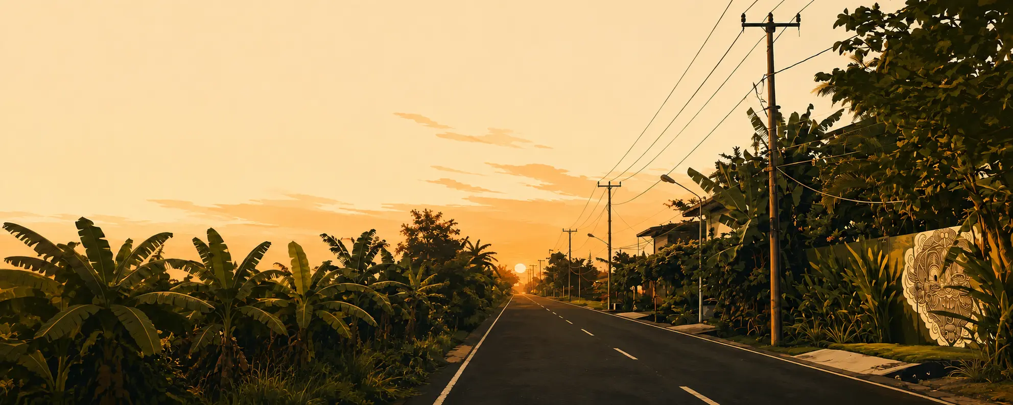 A road disappearing into a tropical landscape